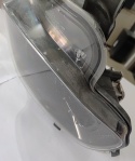 Reflektor przedni lewy uszkodzone mocowanieJeep Cherokee 2014-2018 68102849AG